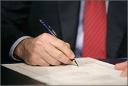 bush-signing-document.jpg